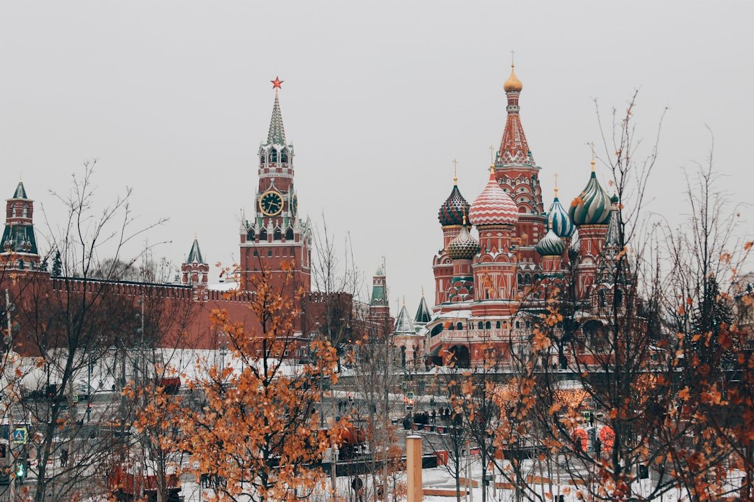 Saint Basil's Cathedral and Spasskaya Tower in Moscow during a snowy winter day